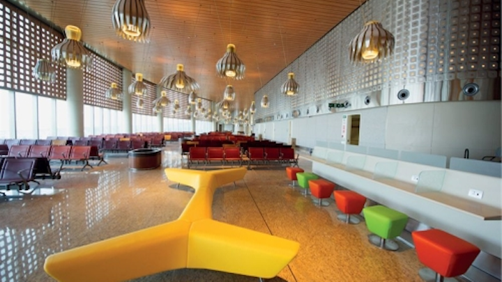 Cooper Lighting linear LED fixtures graze the walls in the new Mumbai airport terminal