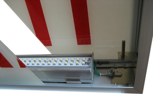Radionic LED retrofit exit sign kit reduces electricity costs in municipal and commercial buildings