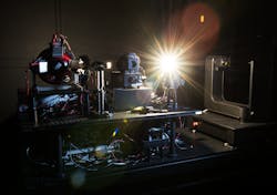A light source called an FEL lamp shines from one of the new automated equipment tables. This table holds all the sources of light that are either being tested or being used to test a detector. Credit: Jennifer Lauren Lee/NIST