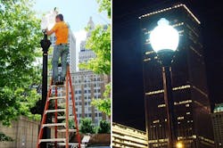 Technicians installing Crossroads LED luminaires