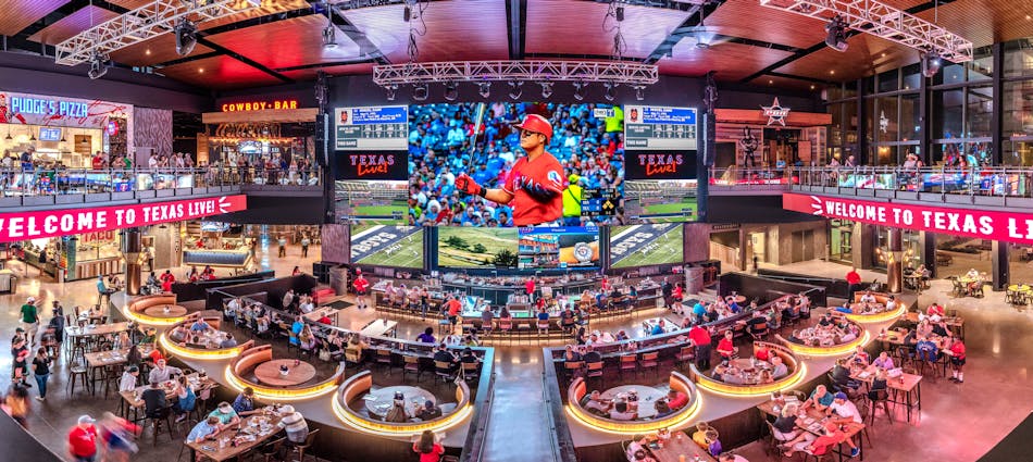 FIG. 1. Four Cordish Companies Live! restaurants have LED-based, direct-view video displays, including this 100-ft diagonal installation in Arlington, TX, that deliver surreal image quality called high dynamic range (HDR) that is due to fast pixel on-off transitions and exceptional contrast ratio. (Photo credit: Image courtesy of The Cordish Companies.)