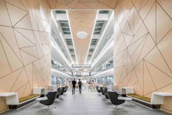Lighting and Bluetooth sensors both connect to Ethernet at Arm&rsquo;s new headquarters using Prolojik technology. The sensors reside on ceilings and walls, outside of the luminaires. (Photo credit: Image courtesy of Hundven-Clements Photography, via Scott Brownrigg architects.)