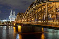 It will take 15 years to replace and connect all of Cologne&rsquo;s 85,000 outdoor light points, but these lights on the city&rsquo;s Hohenzollern Bridge over the Rhine (above), as well as those in the public area featuring the equestrian statue of Kaiser Wilhelm II (below) are among the new installations completed so far in the 2,000+-year-old city, which is today&rsquo;s Germany fourth largest by population. (Photo credit: Images courtesy of Signify.)