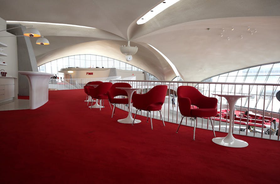 The TWA Flight Center hotel combines the original 60s aesthetic with modern wireless controls and custom, Bluetooth-enabled LED luminaires featuring Xicato light engines. (Photo credit: Image courtesy of Xicato.)