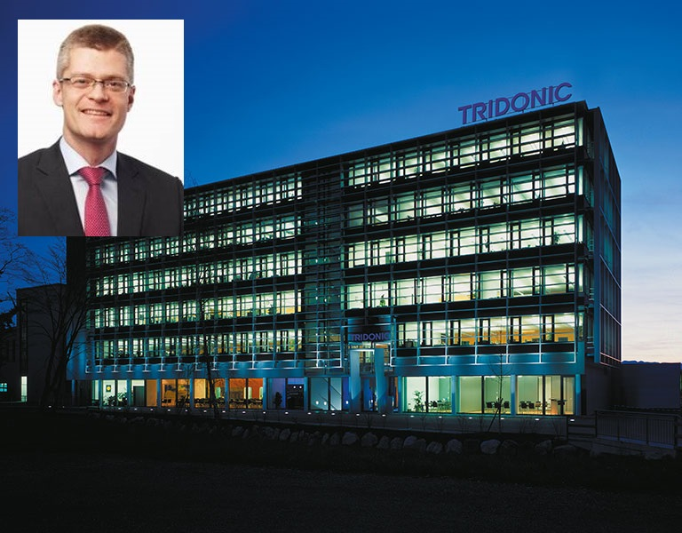 Zumtobel&rsquo;s IoT and lighting controls arm, Tridonic, has appointed Hugo Rohner as its CEO beginning today, May 1. (Photo credits: Tridonic Headquarters, Dornbirn, Austria by Jam Meier; available in the public domain via Wikimedia Commons; https://commons.wikimedia.org/wiki/File:Tridonicgebaeude.jpg. Hugo Rohner image courtesy of Tridonic.)