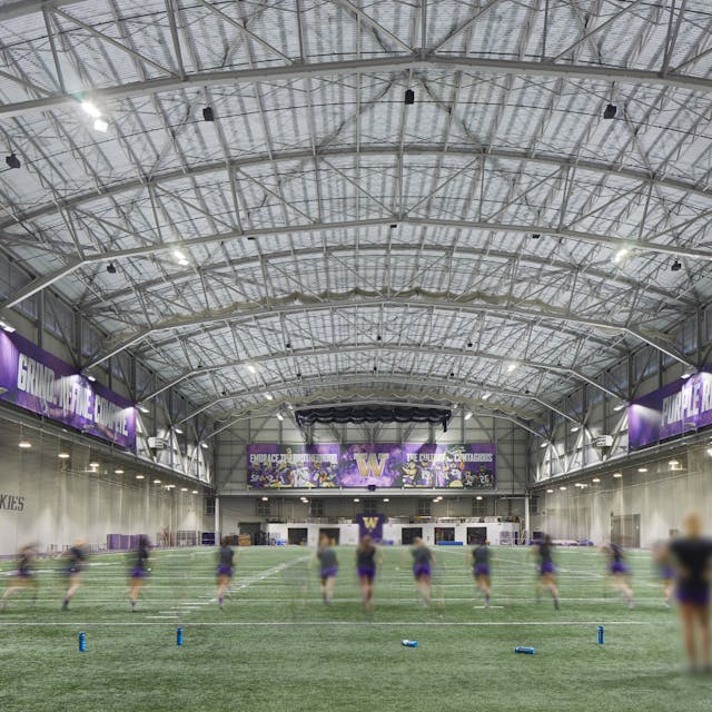 The University of Washington Dempsey Center boasts a higher light level and reduced maintenance with its new sports lighting, delivered by Cree Lighting HXB Series high bays. The LED luminaires improve light uniformity for visibility and broadcasting while achieving significant energy savings. (Photo credit: Image courtesy of Cree Lighting.)