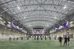 The University of Washington Dempsey Center boasts a higher light level and reduced maintenance with its new sports lighting, delivered by Cree Lighting HXB Series high bays. The LED luminaires improve light uniformity for visibility and broadcasting while achieving significant energy savings. (Photo credit: Image courtesy of Cree Lighting.)