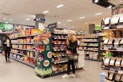 Grocery chain Edeka has placed 31 outward-pointing rectangular UV-C fixtures around a Hamburg store at a height of approximately 11 ft, such as the two on the pillar in the upper center of this photo. (Photo credits: All photos courtesy of Signify.)