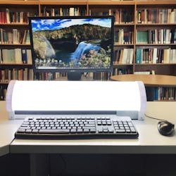 FIG. 1. Shown is an example personal desktop luminaire that sits in front of a computer screen to efficiently deliver daytime circadian lighting. This luminaire has been calibrated to deliver a CS &gt; 0.3 to an occupant sitting up to 30 in. away. Image credits: All photos and illustrations courtesy of Allison Thayer, Lighting Research Center.