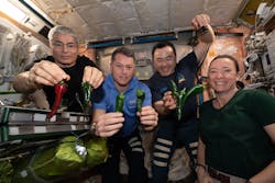 Astronauts show off the peppery haul on the International Space Station.
