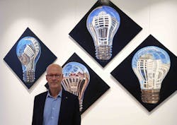 Now is the time to fully embrace light for wellbeing, says Good Light Group chairman Jan Denneman, pictured here in front of his own artwork. Now is the time to fully embrace light for wellbeing, says Good Light Group chairman Jan Denneman, pictured here in front of his own artwork.
