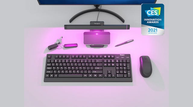 In this image, the lamp is disinfecting a keyboard, a phone, keys, and a mouse. The &ldquo;2021&rdquo; award came roughly a year before the Targus UV-C product recently received UL approval. (Photo credit: Image courtesy of Targus.)