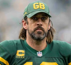For &euro;65 million, you can buy an historic automotive lighting company, but not a star quarterback such as Aaron Rodgers, pictured above. (Image used under CC BY-SA 2.0; https://bit.ly/3JJOOCb.)