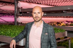 Vaxa founder and CEO Gunnarsson standing next to a tray of arugula (rocket), one of several greens the company grows. &ldquo;The feedback we get is that the quality of the product is better than anything else available on the market in terms of taste, texture, color, and shelf life,&rdquo; he said.