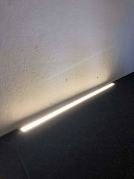 Buro Happold lighting designers tested the backlight of their mock-up of the A-Light mullion-mounted linear LED uplight fixtures to prevent hot spots in Henley Hall&apos;s atrium.