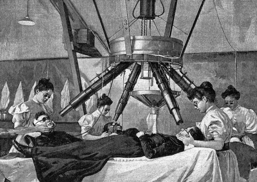 FIG. 1. Finsen light being used to treat lupus vulgaris patients, circa 1900.