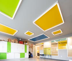 Axis Lighting’s Stencil Forms luminaires create an engaging and whimsical border around colorful ceiling shapes echoed throughout the design of the art room’s furnishings and interior windows. Axis Lighting’s Stencil Forms luminaires create an engaging and whimsical border around colorful ceiling shapes echoed throughout the design of the art room’s furnishings and interior windows.