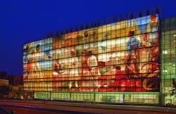 The Harlem Hospital façade celebrates the history of Black Americans with a backlit mural. The Harlem Hospital façade celebrates the history of Black Americans with a backlit mural.