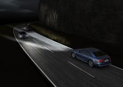 FIG. 2. With advanced headlight systems, the windshield of a vehicle approaching in the opposite direction or the rearview mirror of a followed vehicle can be in continuous shadow at any time, at any distance, and at any speed. Image courtesy Audi of America. FIG. 2. With advanced headlight systems, the windshield of a vehicle approaching in the opposite direction or the rearview mirror of a followed vehicle can be in continuous shadow at any time, at any distance, and at any speed. Image courtesy Audi of America.