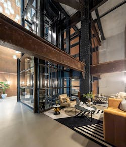 Residential towers combine industrial materials with contemporary layered lighting for an intimate yet spacious feel in entryways. Residential towers combine industrial materials with contemporary layered lighting for an intimate yet spacious feel in entryways.