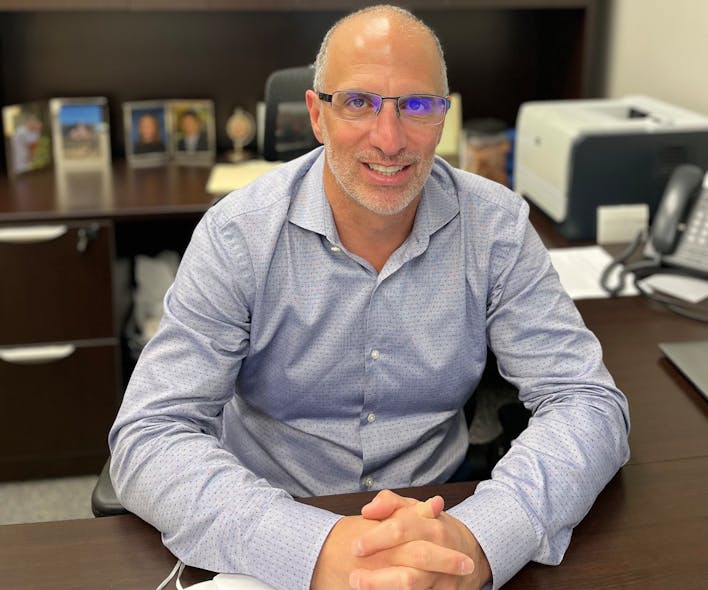 Former Fluence CEO David Cohen pictured above at Dove offices in Webster, New York, near Rochester, where he is the new boss of the company. Dove provides robotics packaging gear for controlled environment agriculture.
