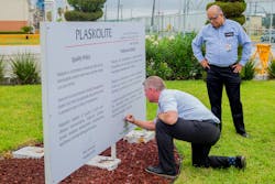 Plaskolite President Ryan Schroeder signing the Plaskolite Quality Policy with Plant Manager Rigoberto Camacho. Plaskolite President Ryan Schroeder signing the Plaskolite Quality Policy with Plant Manager Rigoberto Camacho.