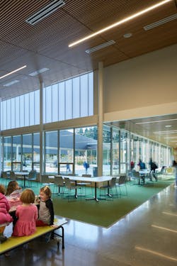 Linear luminaires balance with daylighting at Madrona School. Linear luminaires balance with daylighting at Madrona School.