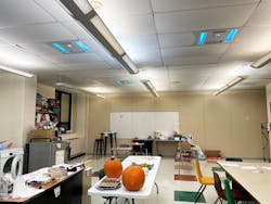 Kinnelon High School was recognized by DOE’s 2023 Integrated Lighting Campaign in the category of GUV Systems for Energy Savings and Improved IAQ. Classrooms at Kinnelon have hybrid UV-C air purifiers and whole-room disinfection luminaires with occupancy sensors that filter air during the day and disinfect surface and airborne pathogens at night. The disinfection system was deployed by partners Casambi Technologies, IntelliSafe IAQ, and McWong International, Inc. Kinnelon High School was recognized by DOE’s 2023 Integrated Lighting Campaign in the category of GUV Systems for Energy Savings and Improved IAQ. Classrooms at Kinnelon have hybrid UV-C air purifiers and whole-room disinfection luminaires with occupancy sensors that filter air during the day and disinfect surface and airborne pathogens at night. The disinfection system was deployed by partners Casambi Technologies, IntelliSafe IAQ, and McWong International, Inc.