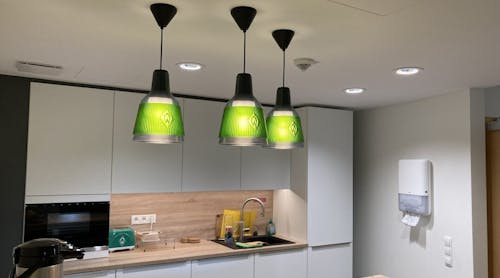 Signify continues to advance its sustainability initiatives, including 3D printing of products such as the pendants pictured above, made from recycled material for fans of Germany&rsquo;s Werder Bremen soccer team.