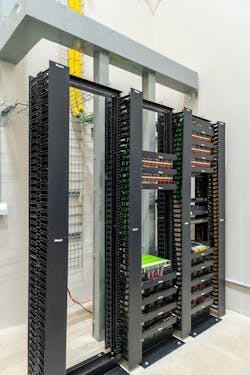 Servers, network switches, and transmitters at the headend provide power, connectivity, and control for the PoE lighting system at Mouser Electronics.