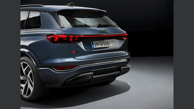 OLED tail lights on Audi’s Q6 e-tron include road safety signs.